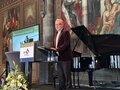 64. Deutscher Verkehrsgerichtstag Der Präsident des Deutschen Verkehrsgerichtstags steht auf der Bühne am Rednerpult und eröffnet die Veranstaltung.